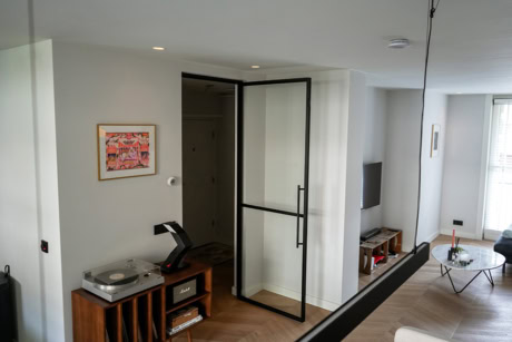 Black steel hinged door