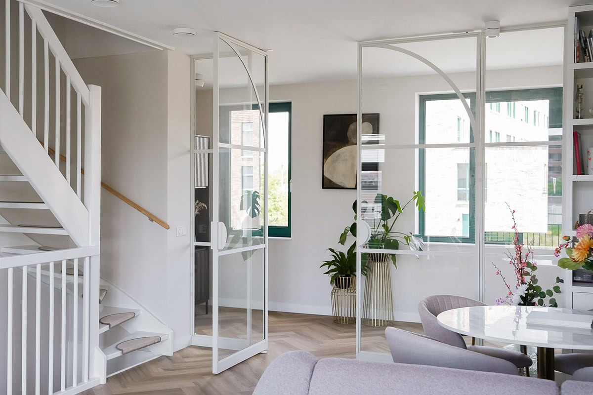 Double pivot door in a white colour from Aluwdoors.