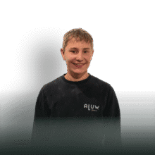 Body of boy in black ALUW doors sweatshirt for the aluwdoors.com website.