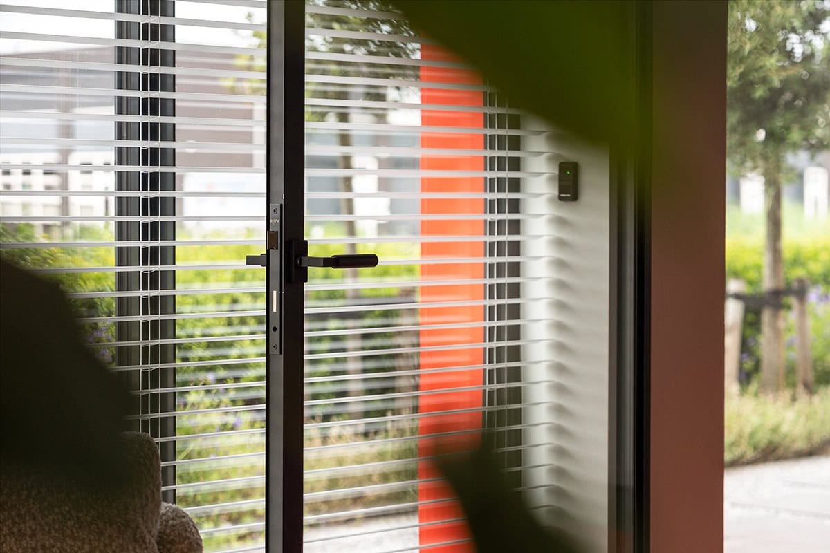 Hinged door with latch