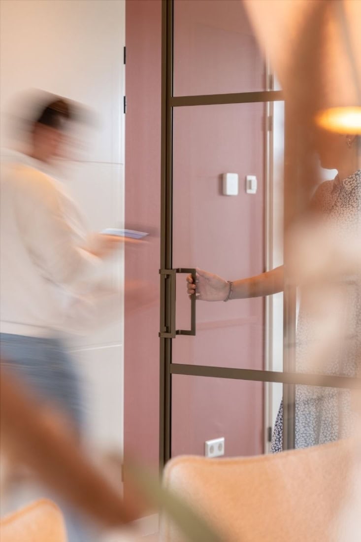 The corner handle on a sliding door.