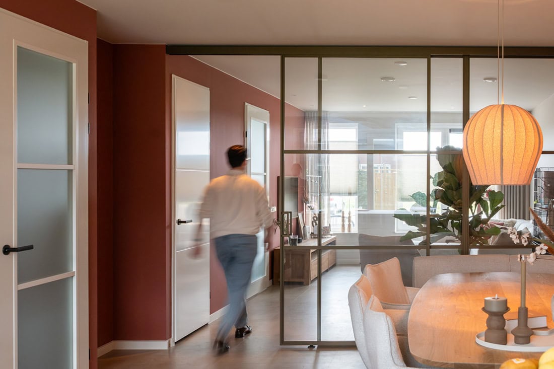 Bespoke modern steel interior doors and walls in a contemporary home.