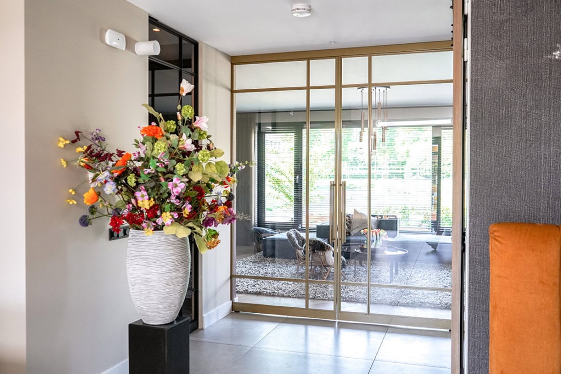 Elegant bespoke steel wall and door arrangement, ideal for modern interior designs, made by Aluwdoors.