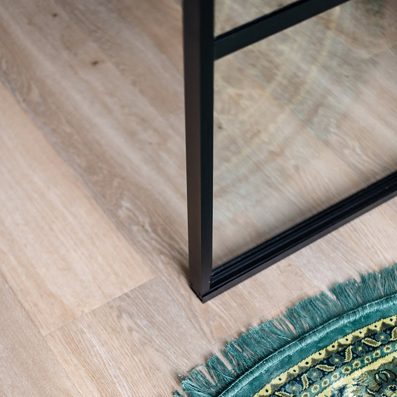 Sleek steel door with bespoke glass panels, modern interior design, high-quality finish by Aluwdoors.