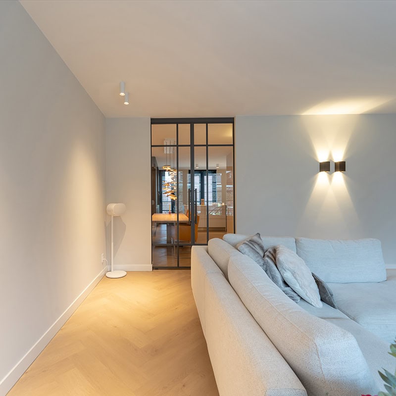 Elegant steel interior wall section with walk-in door and modern partition for sleek interiors.