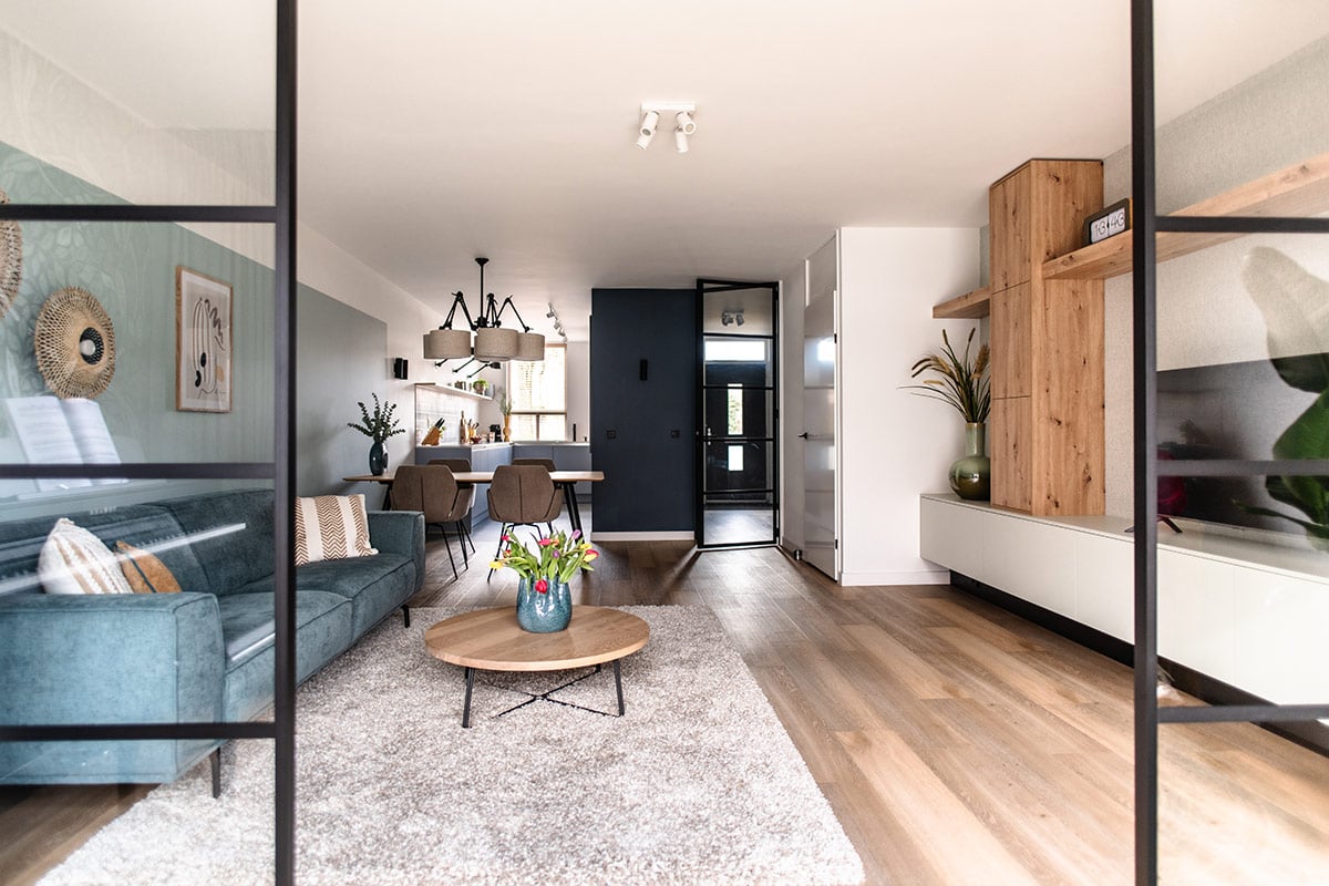 Elegant steel partition with black metal frame for a modern interior space.