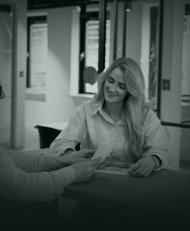 Elegant steel door with custom-made walls in modern interior.