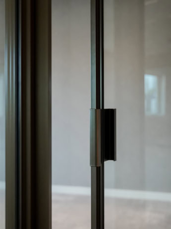 High-quality steel door with a sleek finish, designed for customisation and durability in any space.