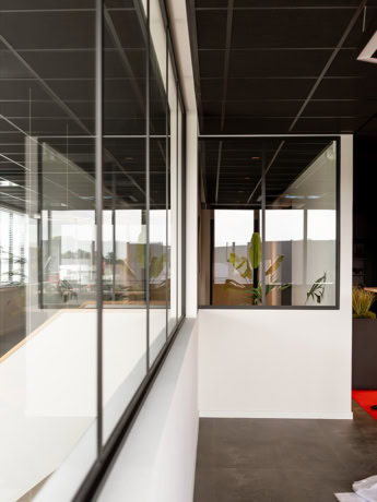 High-quality custom steel doors with glass panels, perfect for modern interiors and office spaces, durable and stylish.