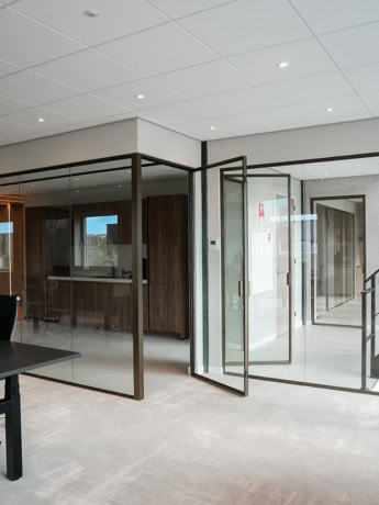 Elegant custom-made steel doors and walls with glass for a modern look, high quality and custom-made by Aluwdoors.