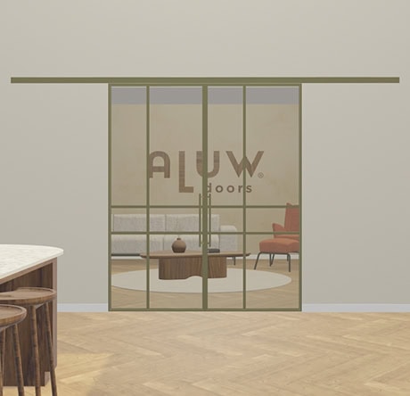 Glass steel door with the ALUW logo, separates the living room from the dining room, modern and stylish design, custom-made steel doors and walls for an elegant interior finish.